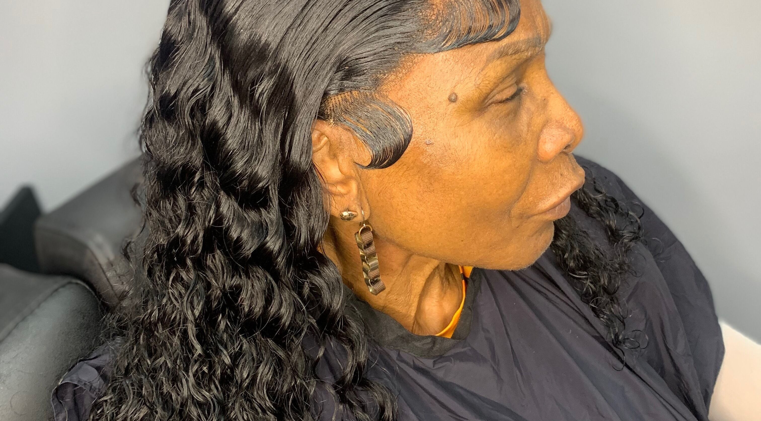 Woman's styled hair with waves at Glamazon Salon, Nassau, New Providence, BS.