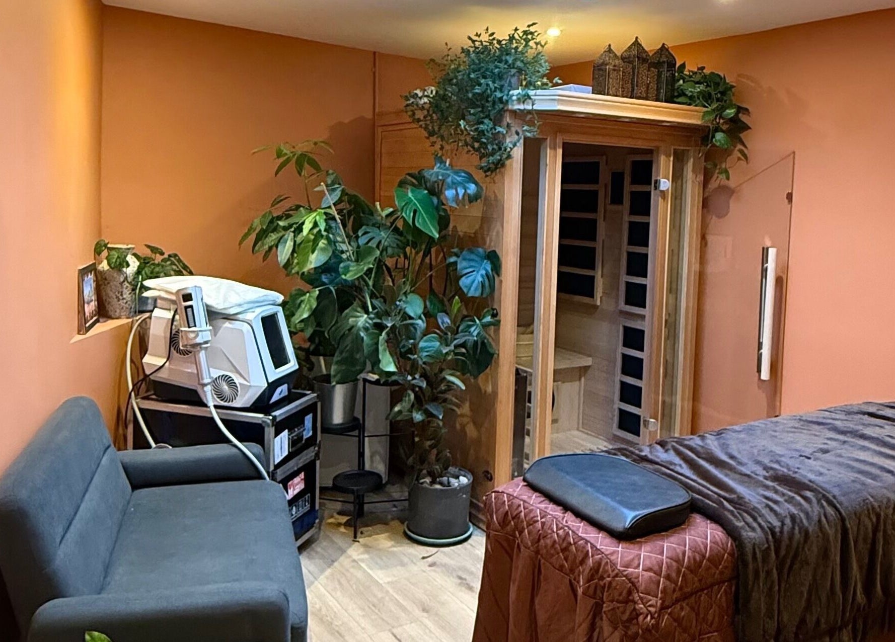 View of a serene treatment room with sauna at Point G, London, England, GB.