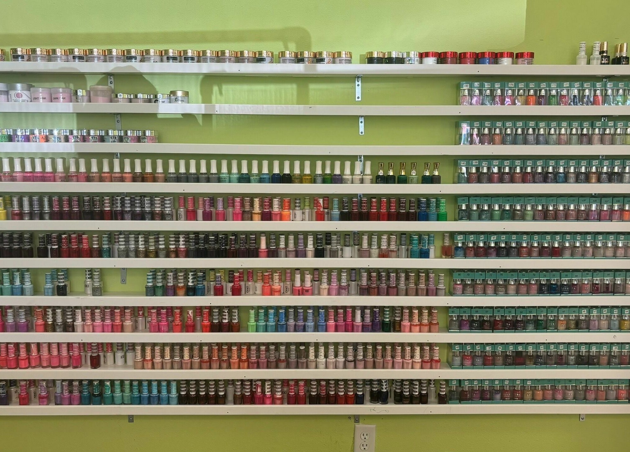 Extensive nail polish collection at Great Professional TA Nails, Beaverton, Oregon, US.