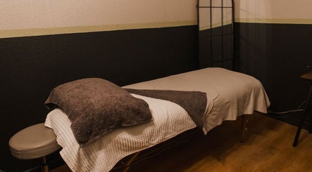 Relaxing massage table at Vs Skin in Glasgow, Scotland, GB ready for a soothing wellness experience.