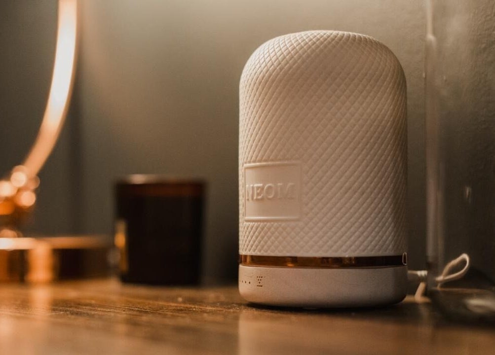 Elegant diffuser on a wooden table at Vs Skin in Glasgow, Scotland, GB, creating a serene atmosphere.