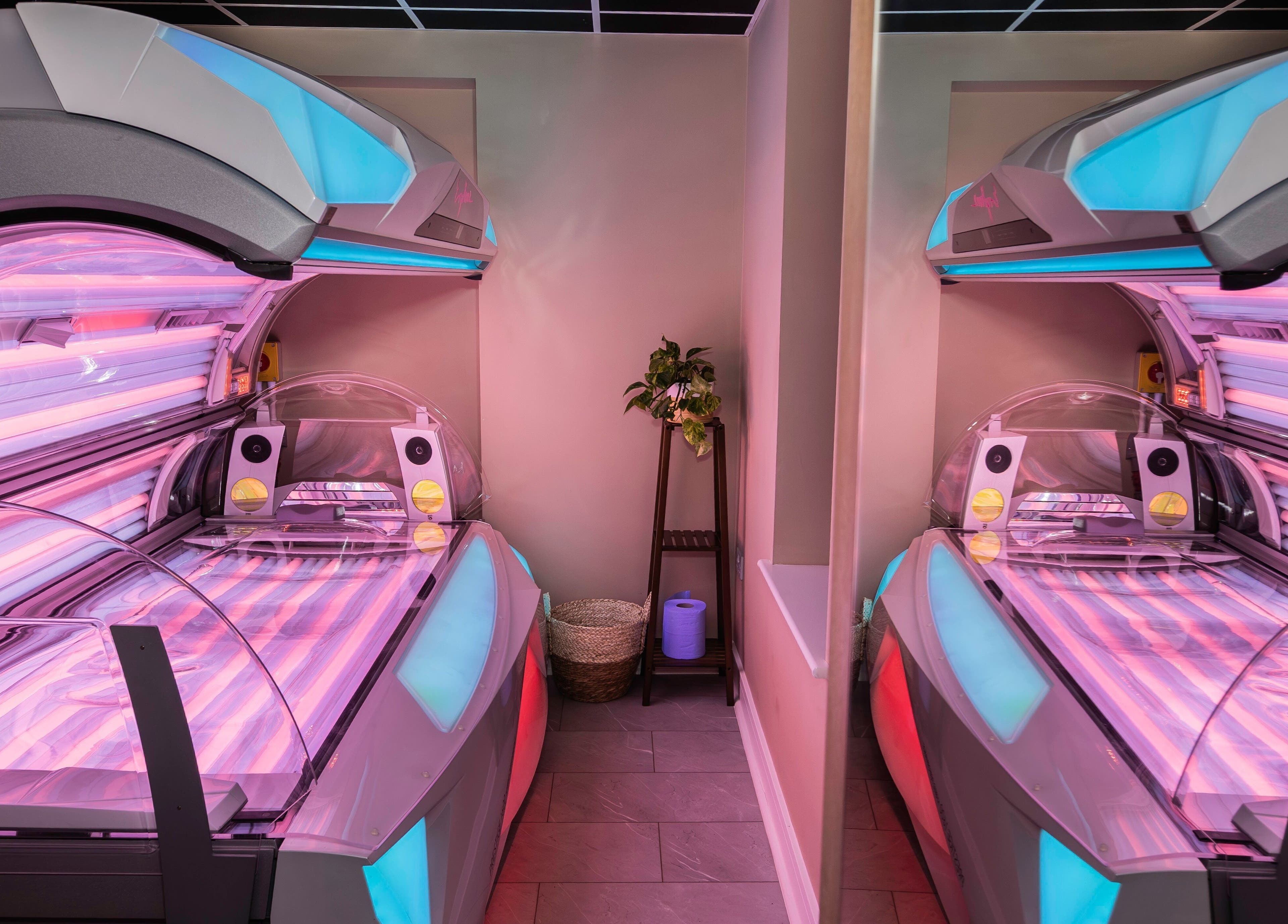 Modern tanning beds at Glow Club, Skegness, GB, offering luxurious wellness services.