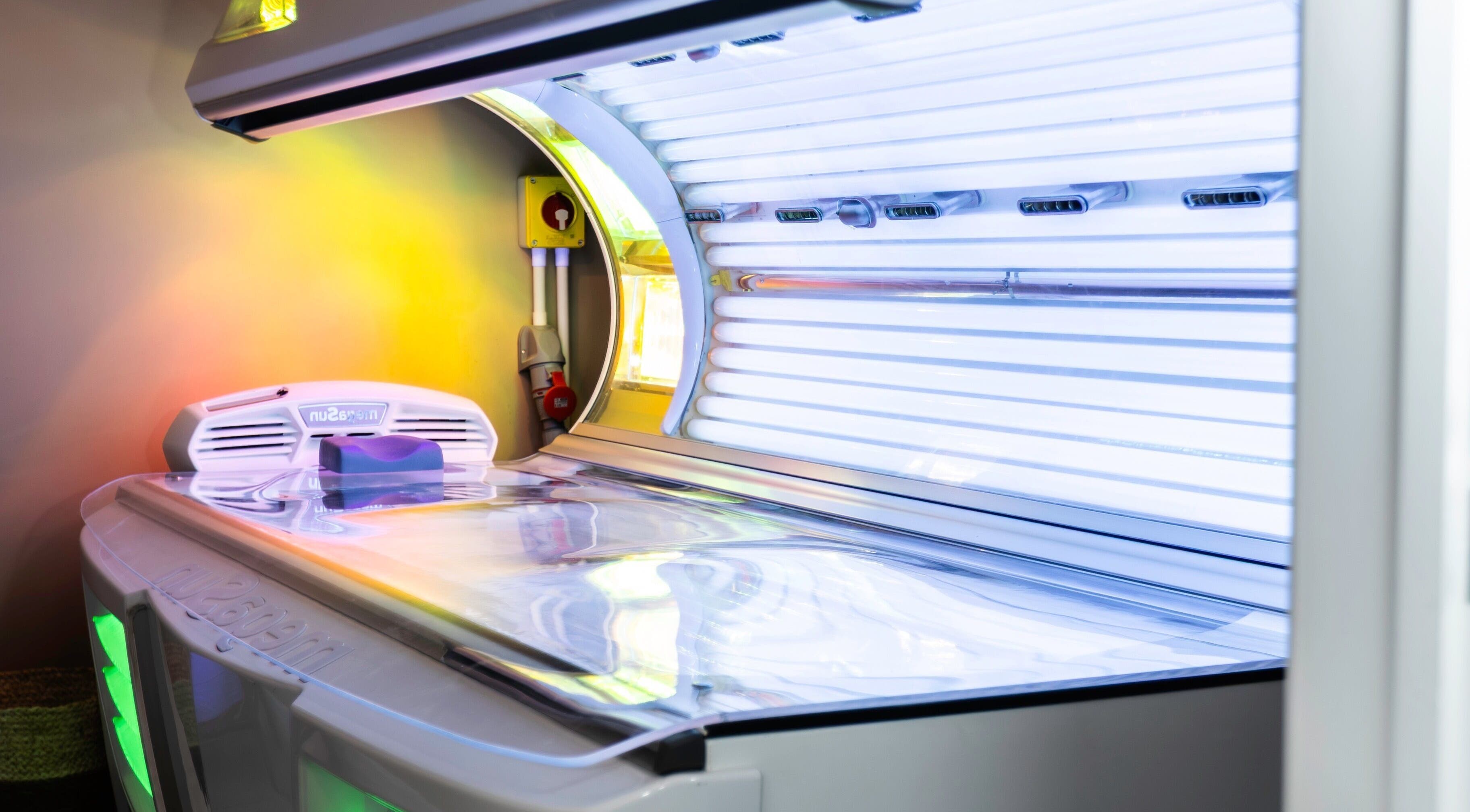 Modern tanning bed at Glow Club, Skegness, GB, offering premier sunbed sessions for a flawless tan.