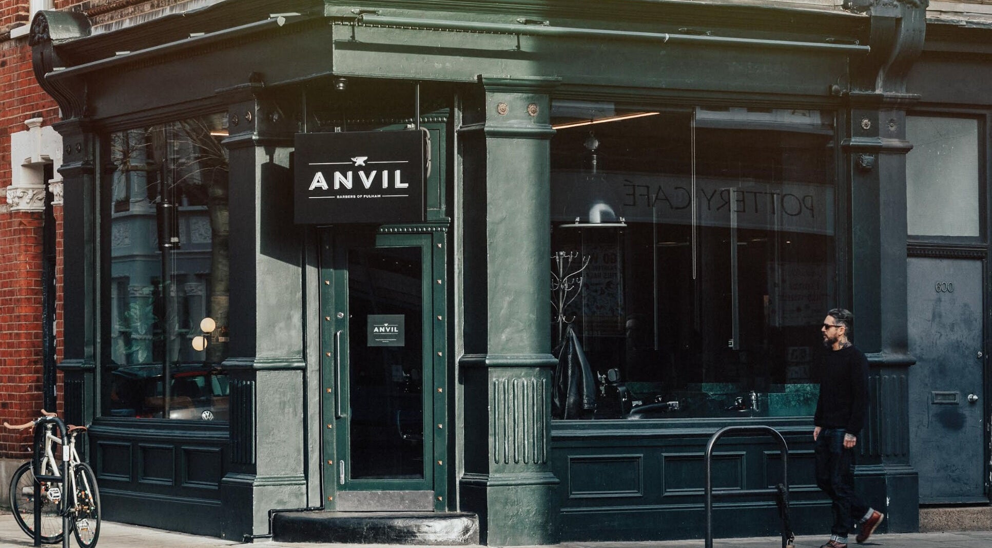 Front view of Anvil Barbers, London, England, GB showcasing classic architecture.