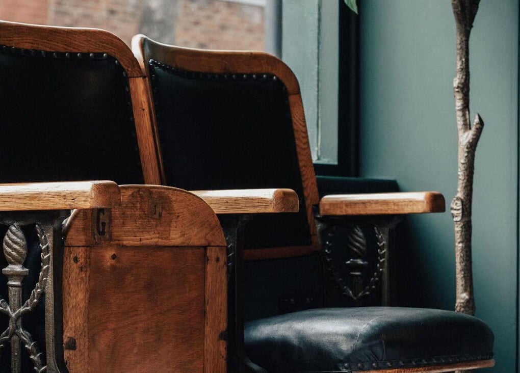 Vintage barber chairs at Anvil Barbers, London, England, GB, showcasing classic style and elegance.
