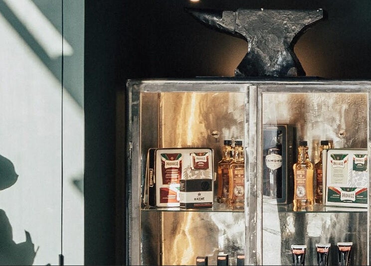 Anvil Barbers product showcase in London, England, GB with grooming items and elegant decor.