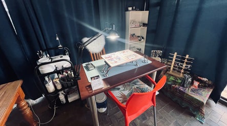 Nail art station at Kara Beauty in Cape Town, Western Cape, ZA, showcasing tools and polish options.