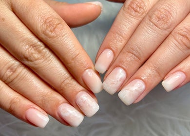 Elegant nail art on hands at Kara Beauty, Cape Town, Western Cape, ZA.