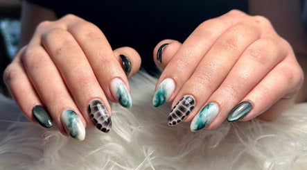 Elegantly designed nails at Kara Beauty in Cape Town, Western Cape, ZA, showcasing trendy, artistic patterns.