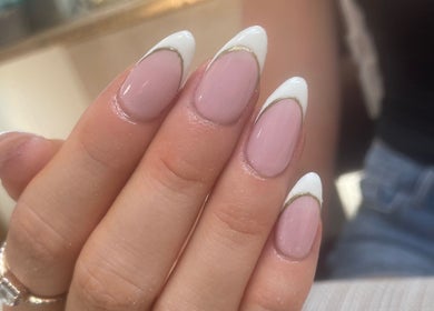Elegant French manicure at Evergreen Beauty and Wellness, Desborough, England, GB, showcasing stylish nail art.