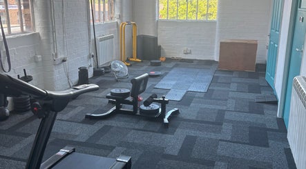 Bruprofitness Sports massage gym space in Nottingham, England, GB with equipment and bright windows.