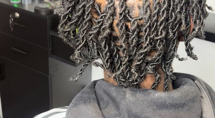 Close-up of stylish twisted hair at pmhairlounge, London, England, GB. Expertly styled natural curls.