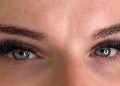 Close-up of lash extensions at Get Lashed with Ab, Basildon, England, GB. Enhancing eye beauty.