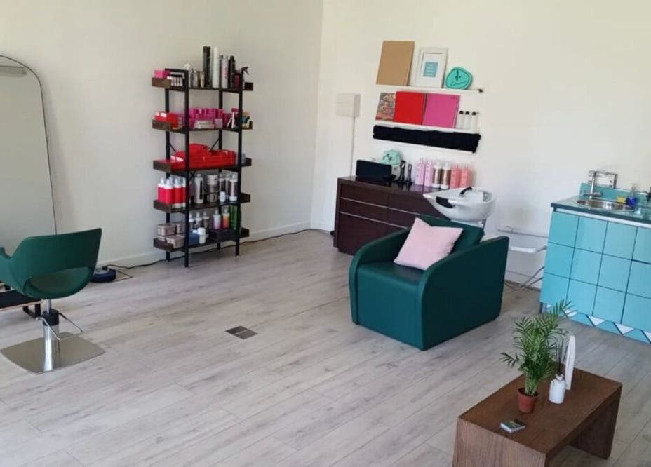 The Good Hair Studio in London, England, GB. Modern salon interior with stylish seating and hair products.