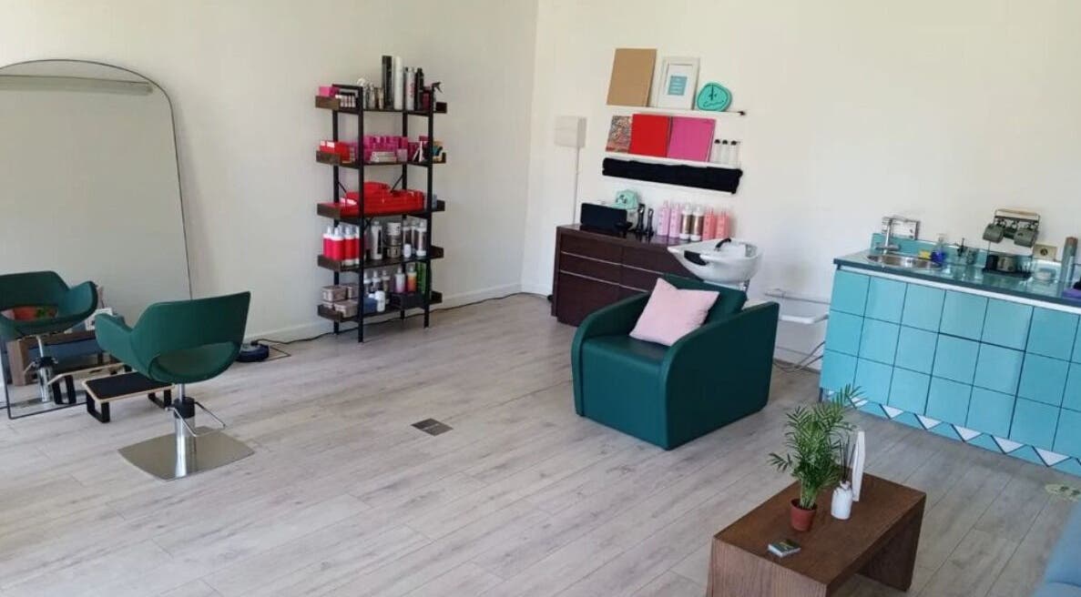 The Good Hair Studio in London, England, GB. Modern salon interior with stylish seating and hair products.