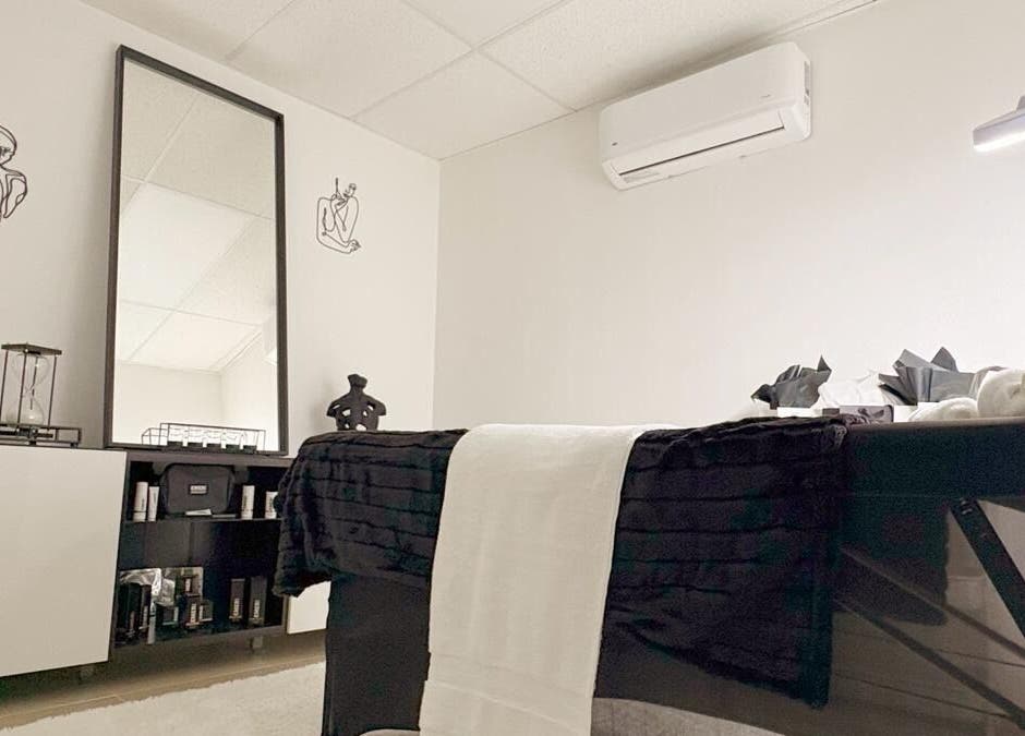 Elegant therapy room at Smoothaestheticpr, San Juan, San Juan, PR, featuring a serene and modern decor.