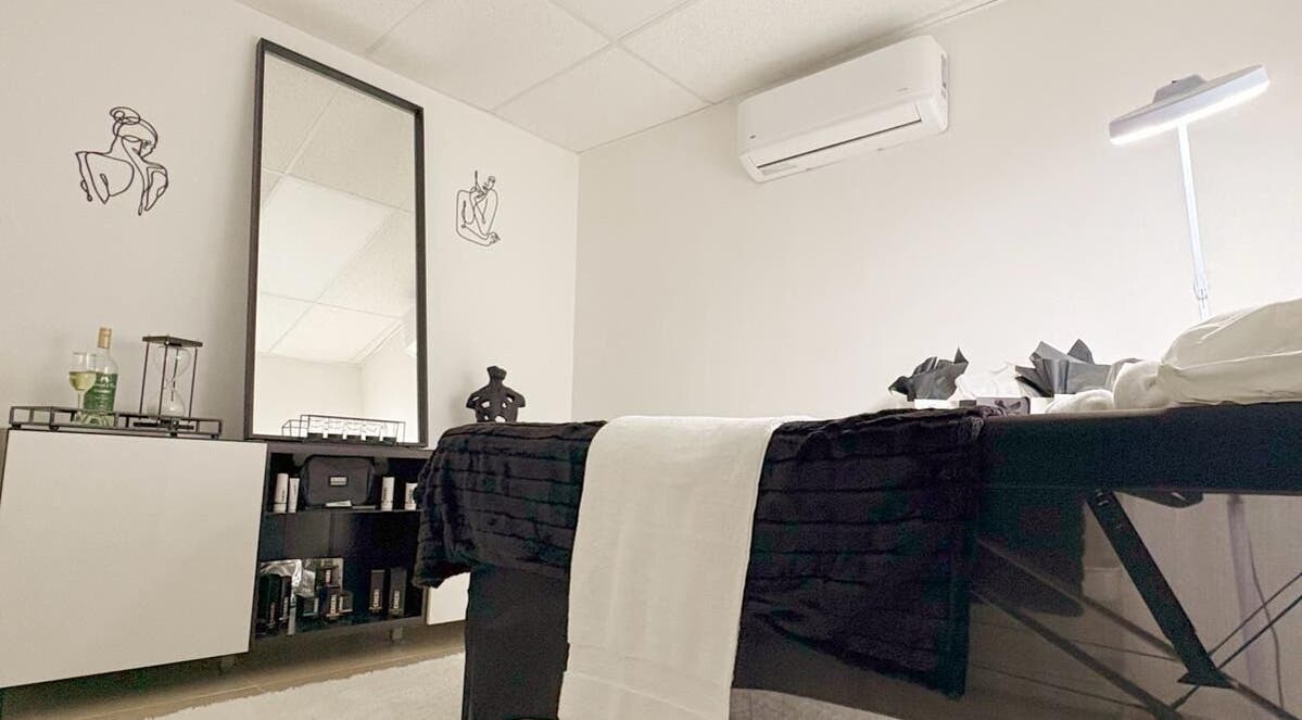 Elegant therapy room at Smoothaestheticpr, San Juan, San Juan, PR, featuring a serene and modern decor.