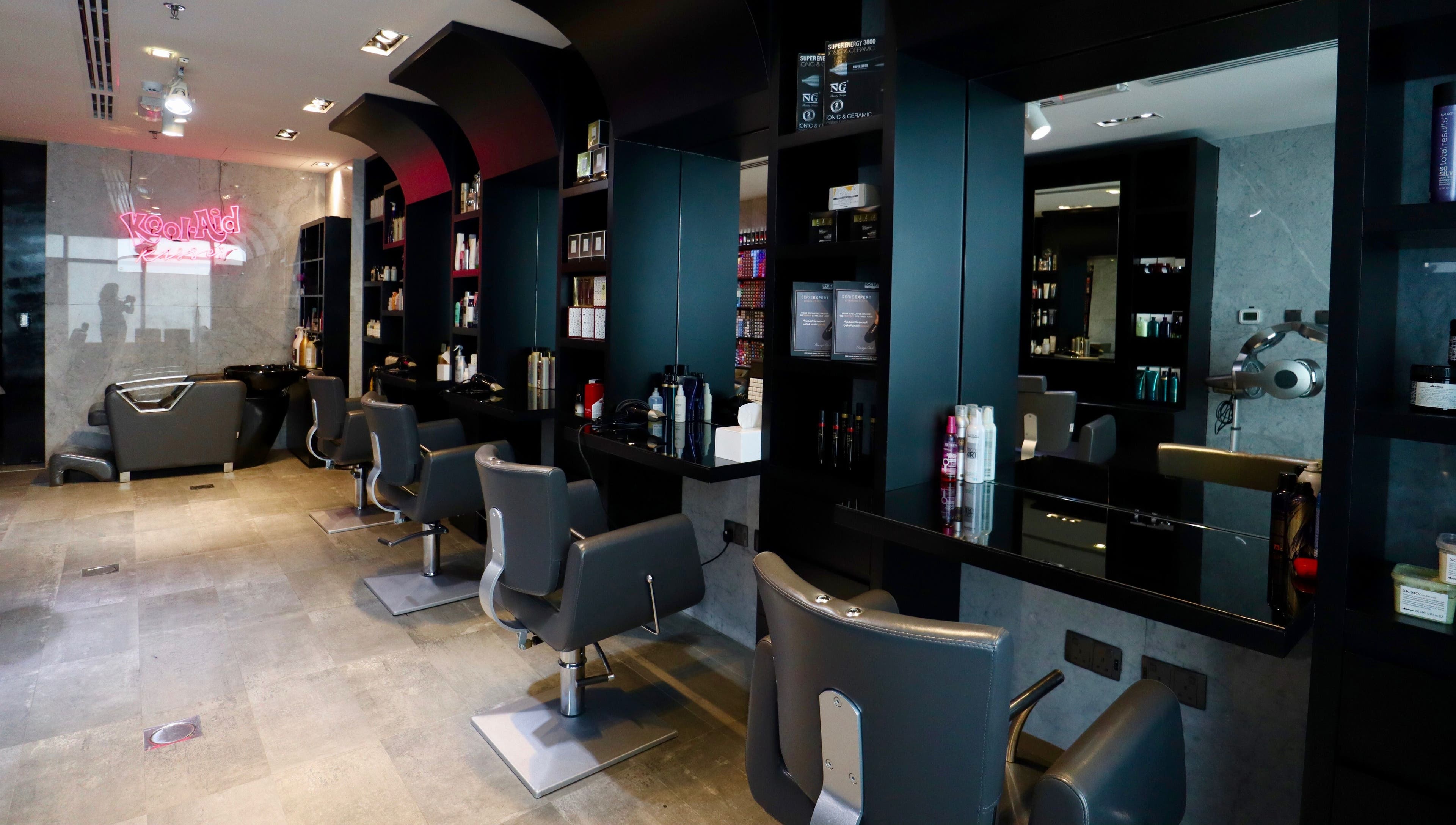 Stylish interior of The Nail Pavilion JLT in Dubai, Dubai, AE featuring modern salon chairs and equipment.