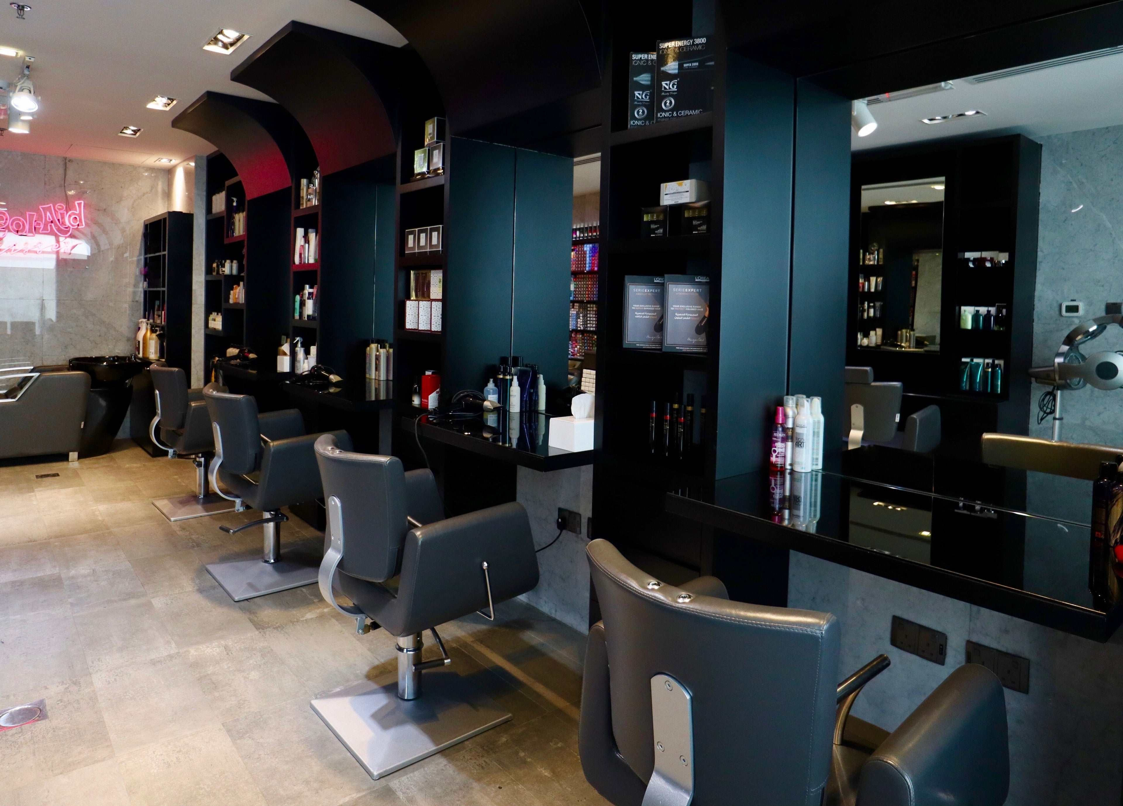 Stylish interior of The Nail Pavilion JLT in Dubai, Dubai, AE featuring modern salon chairs and equipment.