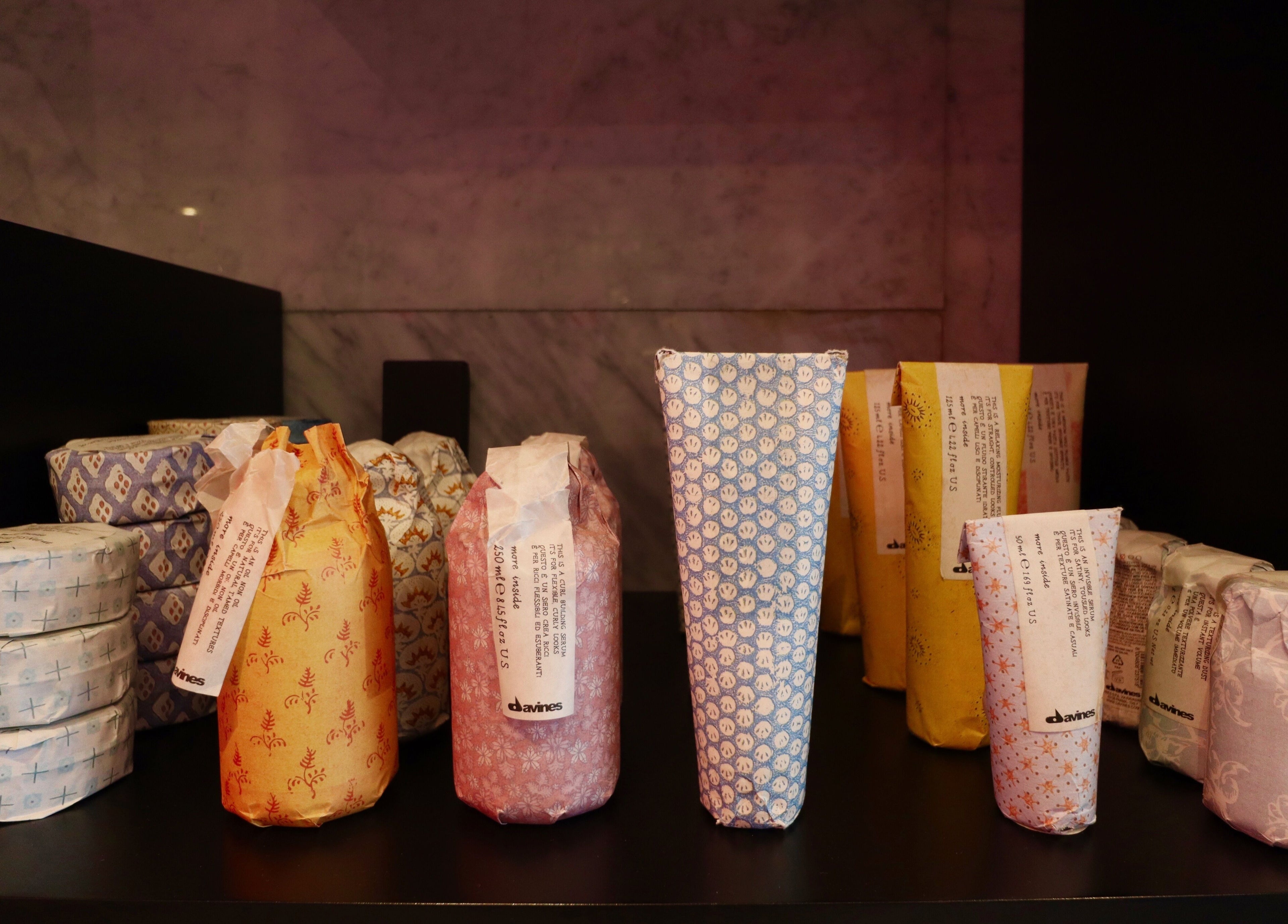 Colorful beauty product packages at The Nail Pavilion JLT, Dubai, Dubai, AE, showcasing elegance and style.