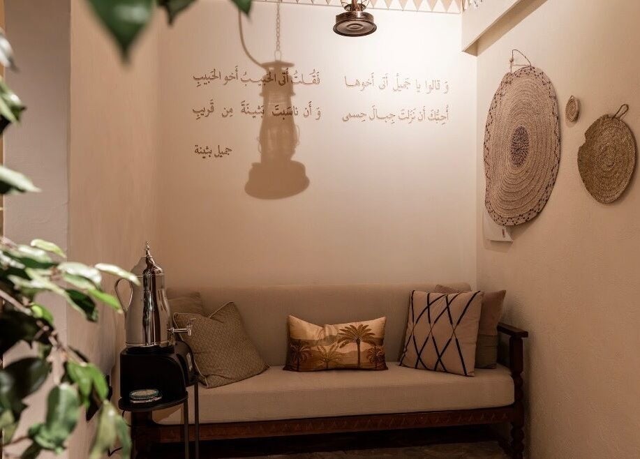 Elegant lounge area in Hisma Spa, Riyadh, Riyadh Province, SA with plush cushions and warm lighting.