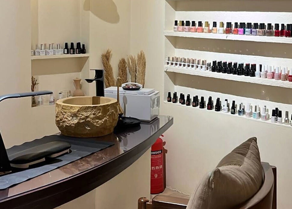 Stylish nail polish display at Hisma Spa, Riyadh, Riyadh Province, SA, showcasing relaxation and elegance.