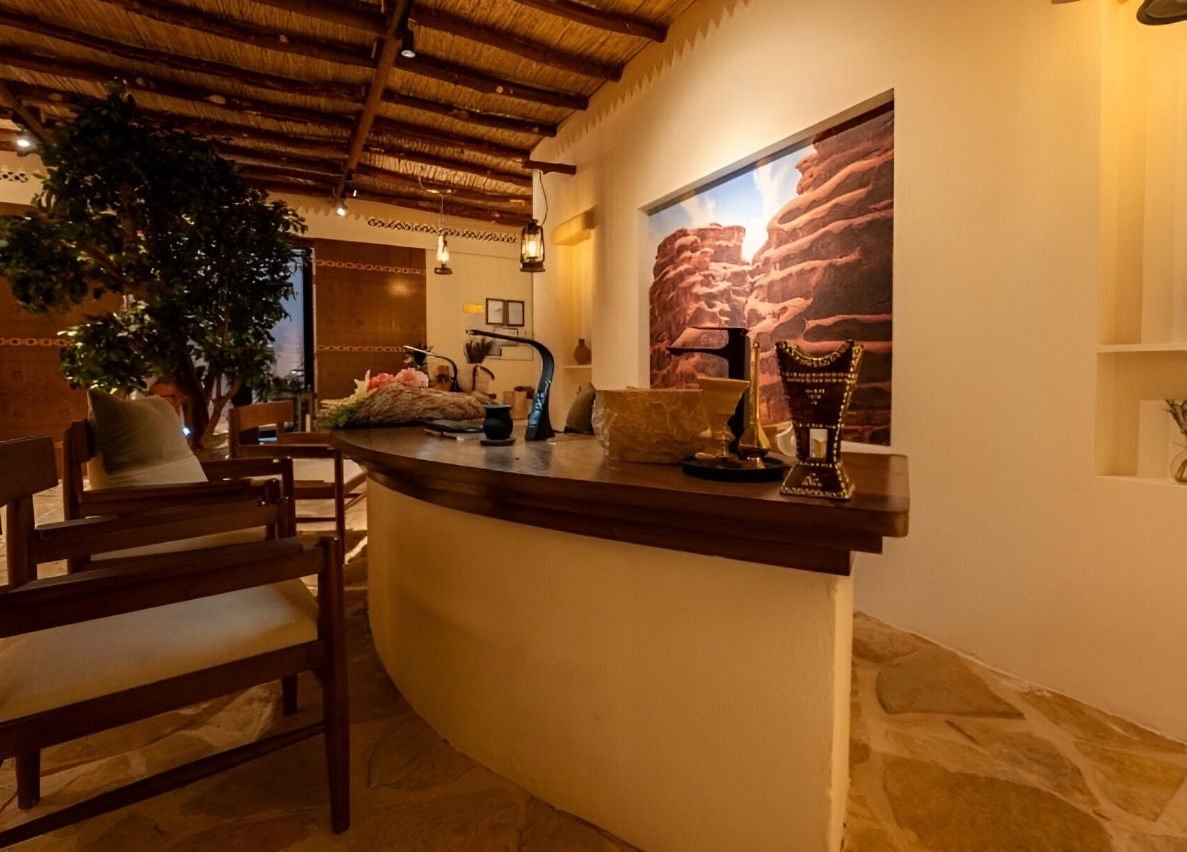 Inviting reception area at Hisma Spa in Riyadh, Riyadh Province, SA, with elegant decor and cozy seating.