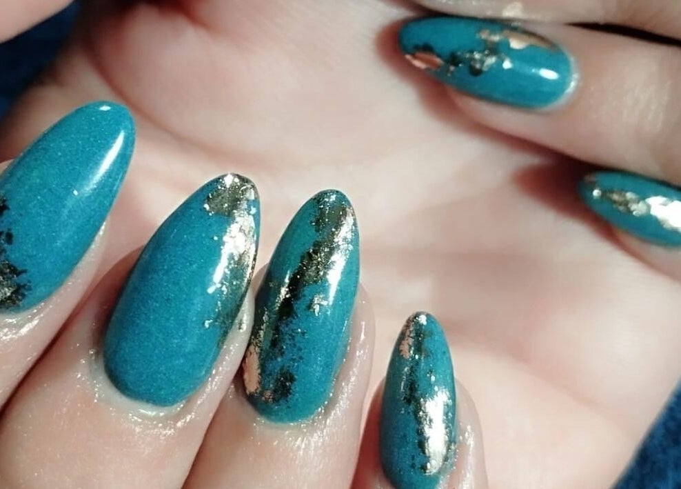 Elegant teal nails with gold accents at Classic Touch- Skincare & Nail Clinic, Rustenburg, North West, ZA.