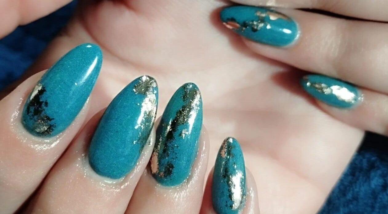 Elegant teal nails with gold accents at Classic Touch- Skincare & Nail Clinic, Rustenburg, North West, ZA.