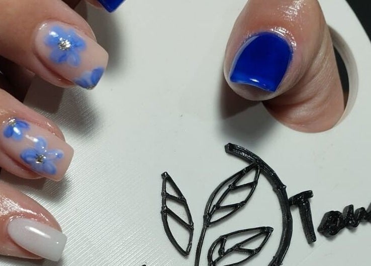 Blue floral nail art at Classic Touch- Skincare & Nail Clinic, Rustenburg, North West, ZA.