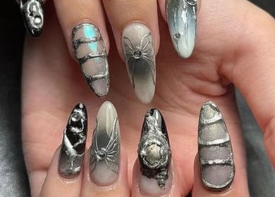 Intricate nail art with metallic designs at 22 Nail Bar, Richmond, British Columbia, CA.