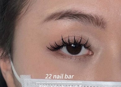 Close-up of elegant eyelashes at 22 Nail Bar in Richmond, British Columbia, CA, showcasing detailed beauty work.