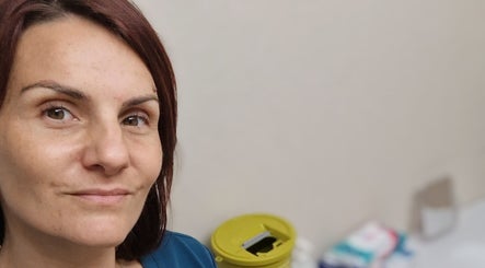 Professional at Aesthetics by Ria in treatment room, Bournemouth, England, GB.