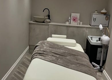 Relaxing therapy room at Balance + Me in Denton, England, GB with a massage bed and peaceful decor.