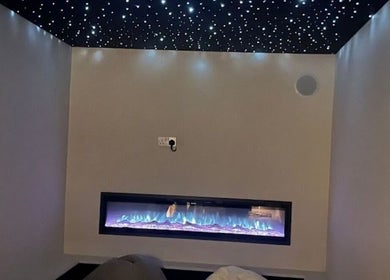 Relaxing starry room with modern fireplace at Balance + Me, Denton, England, GB