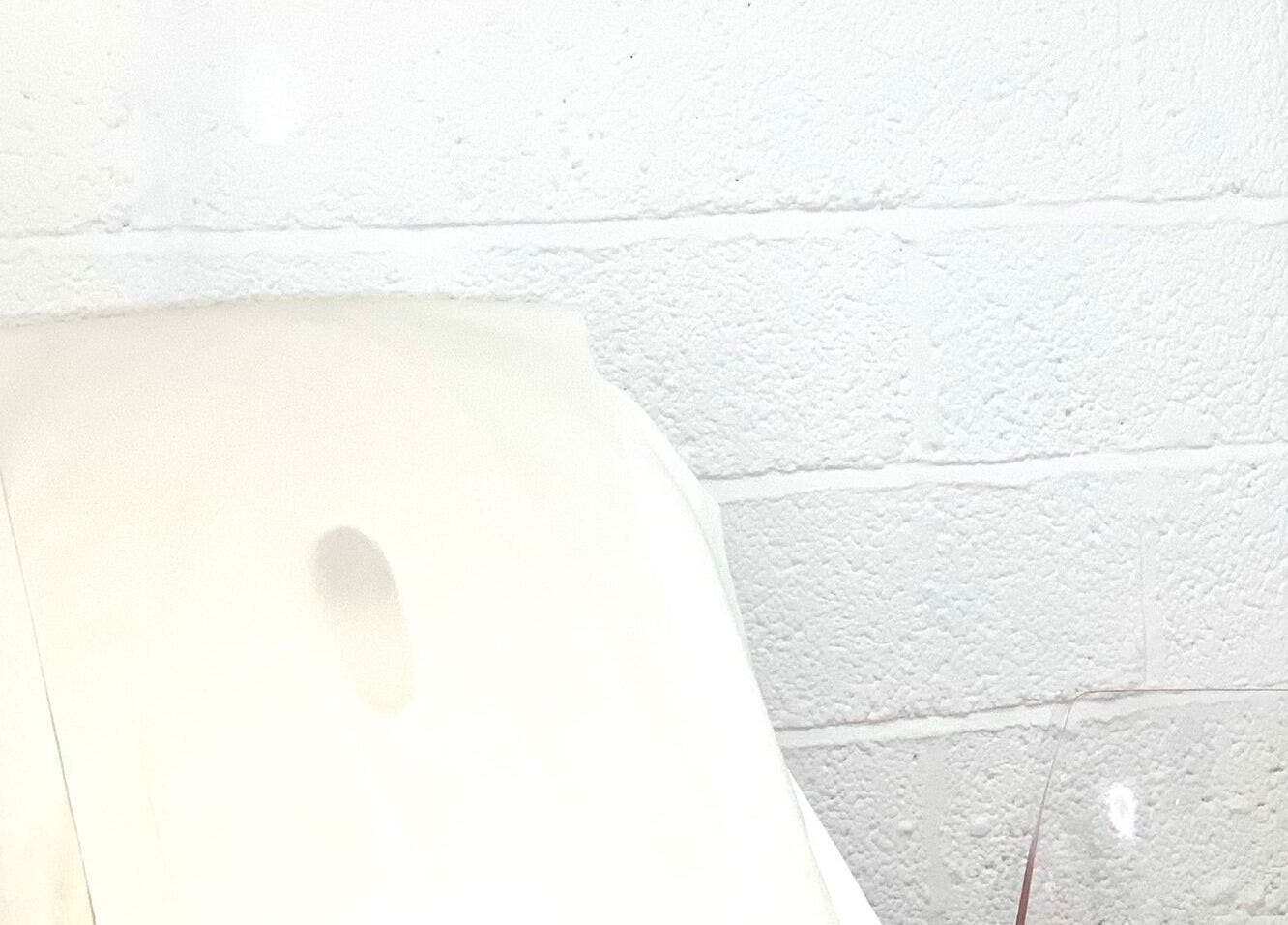 Relaxing treatment chair at Essentials Aesthetic Clinic in London, England, GB, offering a serene environment.