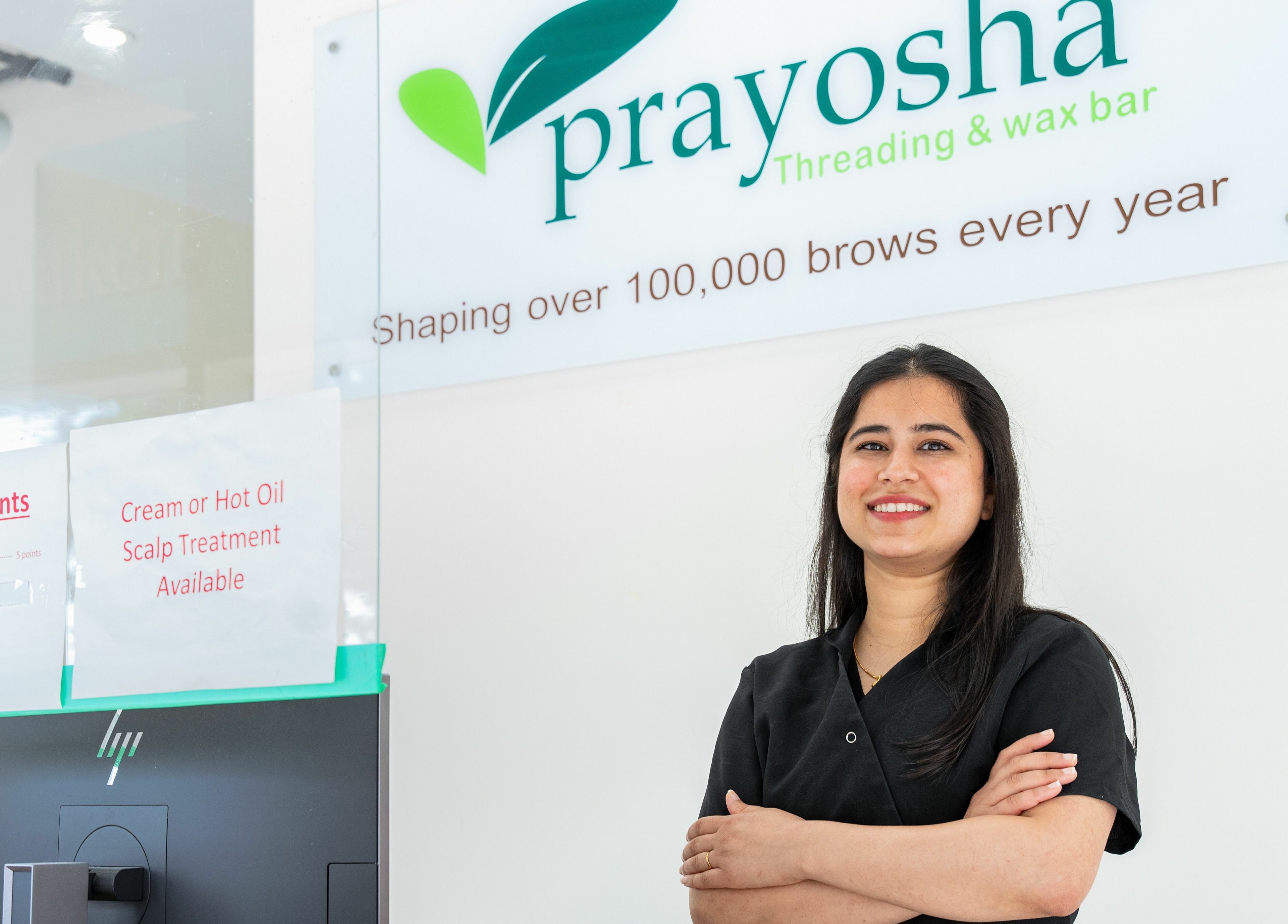 Friendly staff at Prayosha Threading & Wax Bar - Bathurst st. Toronto, Ontario, CA welcoming clients.