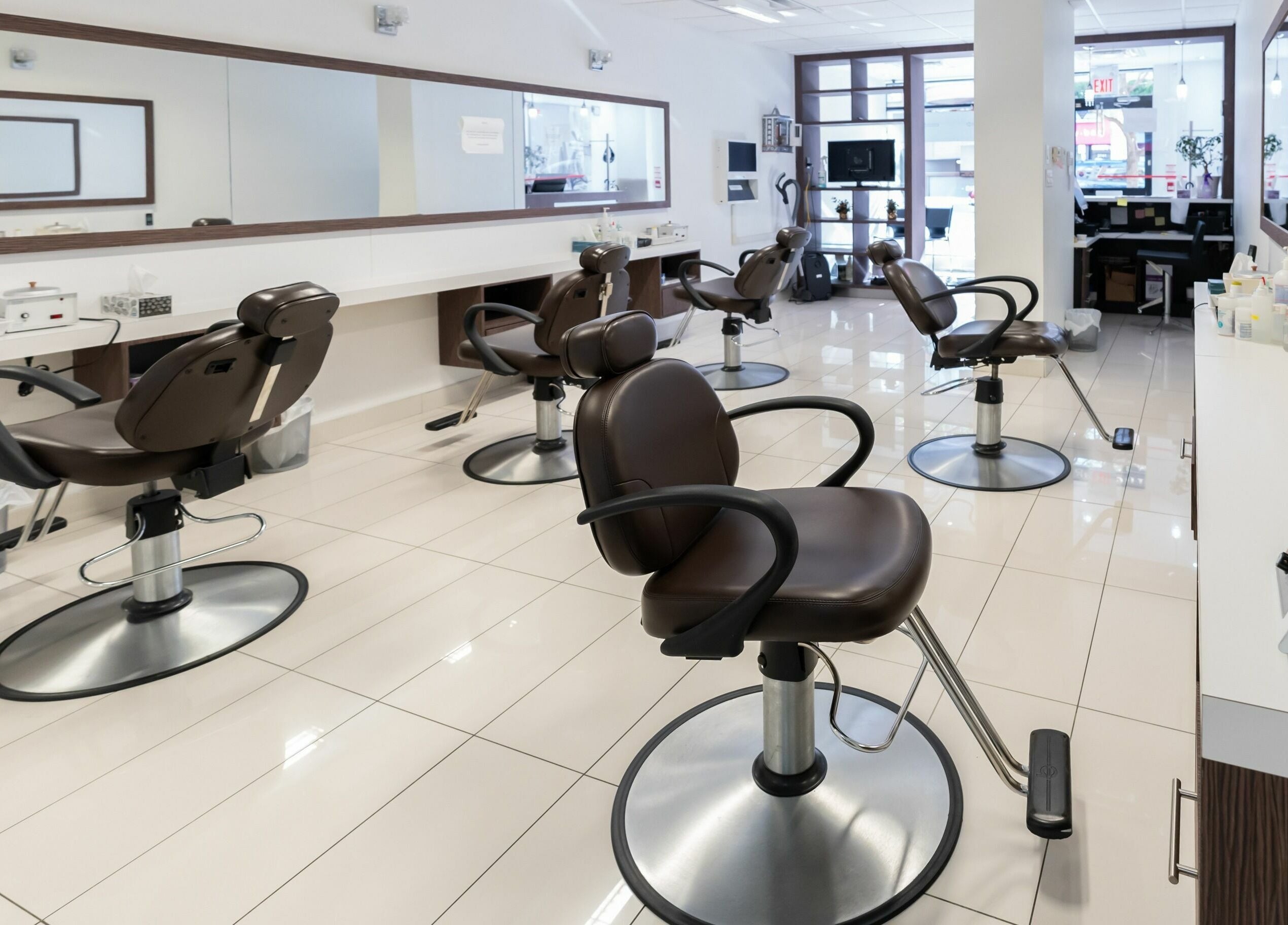 Modern salon interior with chairs at Prayosha Threading & Wax Bar - Younge Street, Toronto, Ontario, CA.