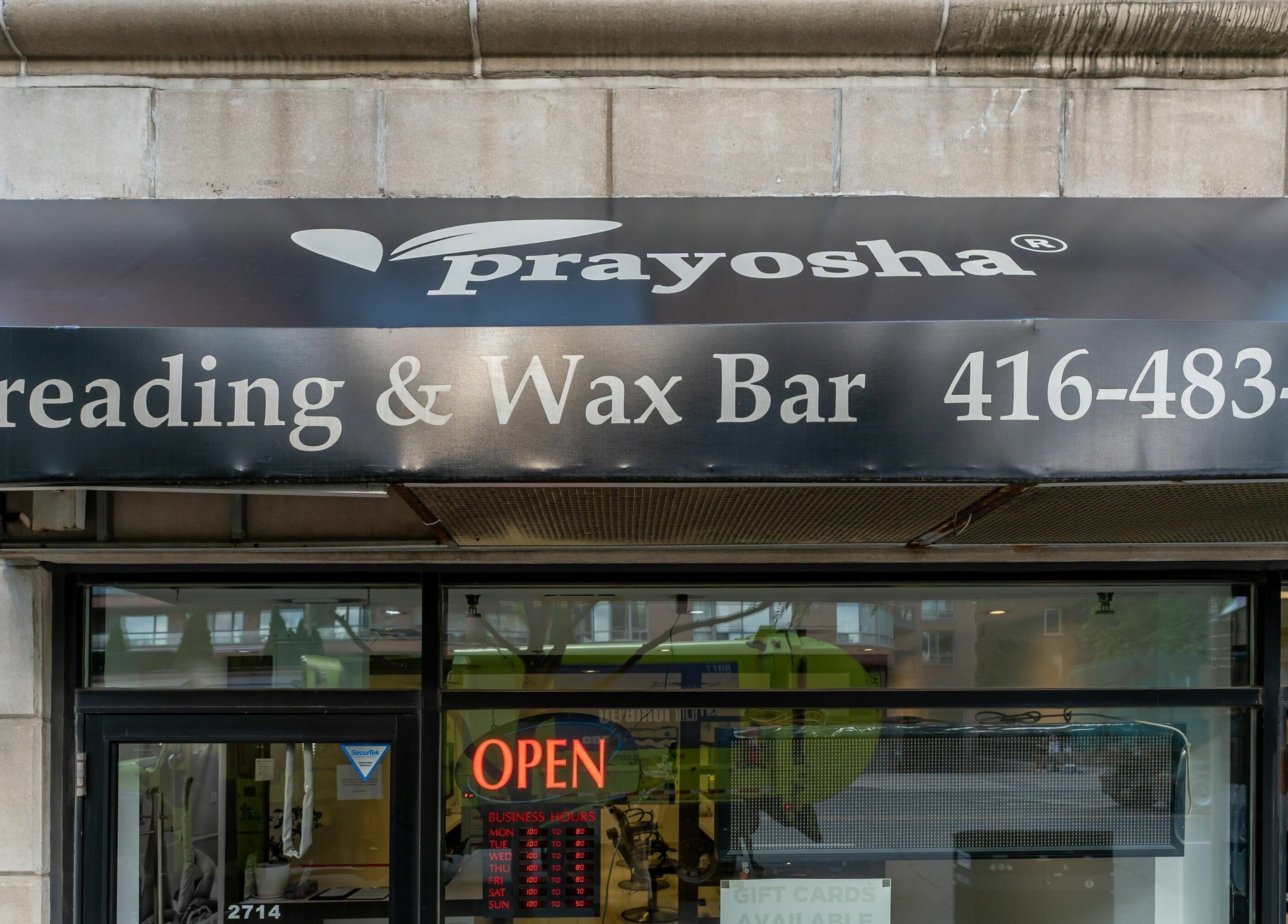Front entrance of Prayosha Threading & Wax Bar - Younge Street, Toronto, Ontario, CA.