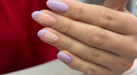 Pastel nail art with floral accents at Nails by Emma, Swanage, England, GB.
