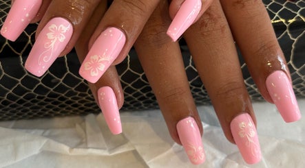 Beautiful pink floral nails designed at Nails by Emma, Swanage, England, GB.