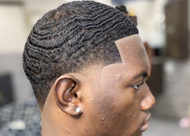 Close-up of expertly styled wave haircut at JaviiClipper.Cutz, Nassau, New Providence, BS.