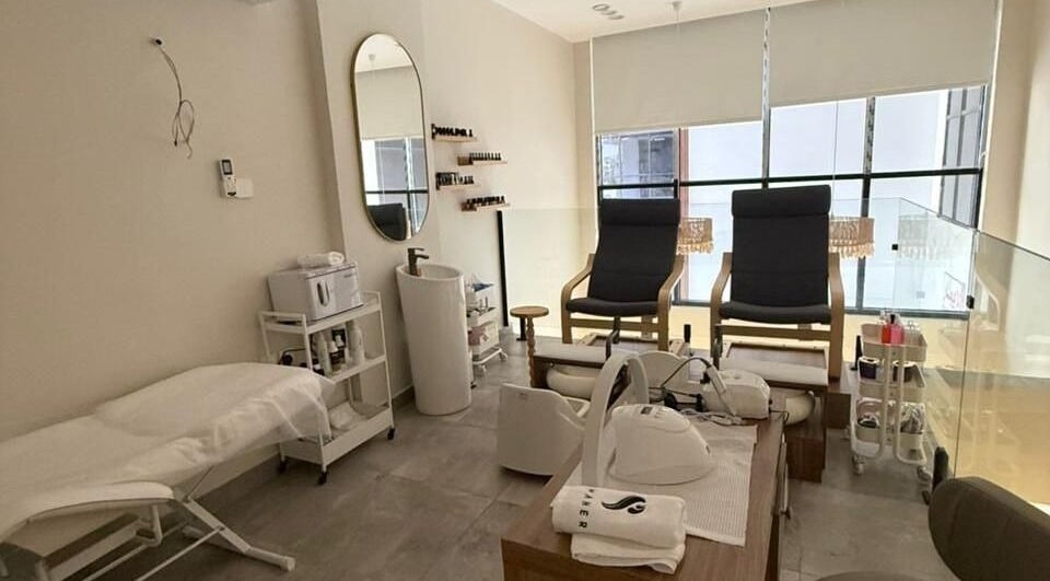 Samaher Salon spa room in Jeddah, Makkah Province, SA, featuring modern pedicure chairs and a relaxing atmosphere.