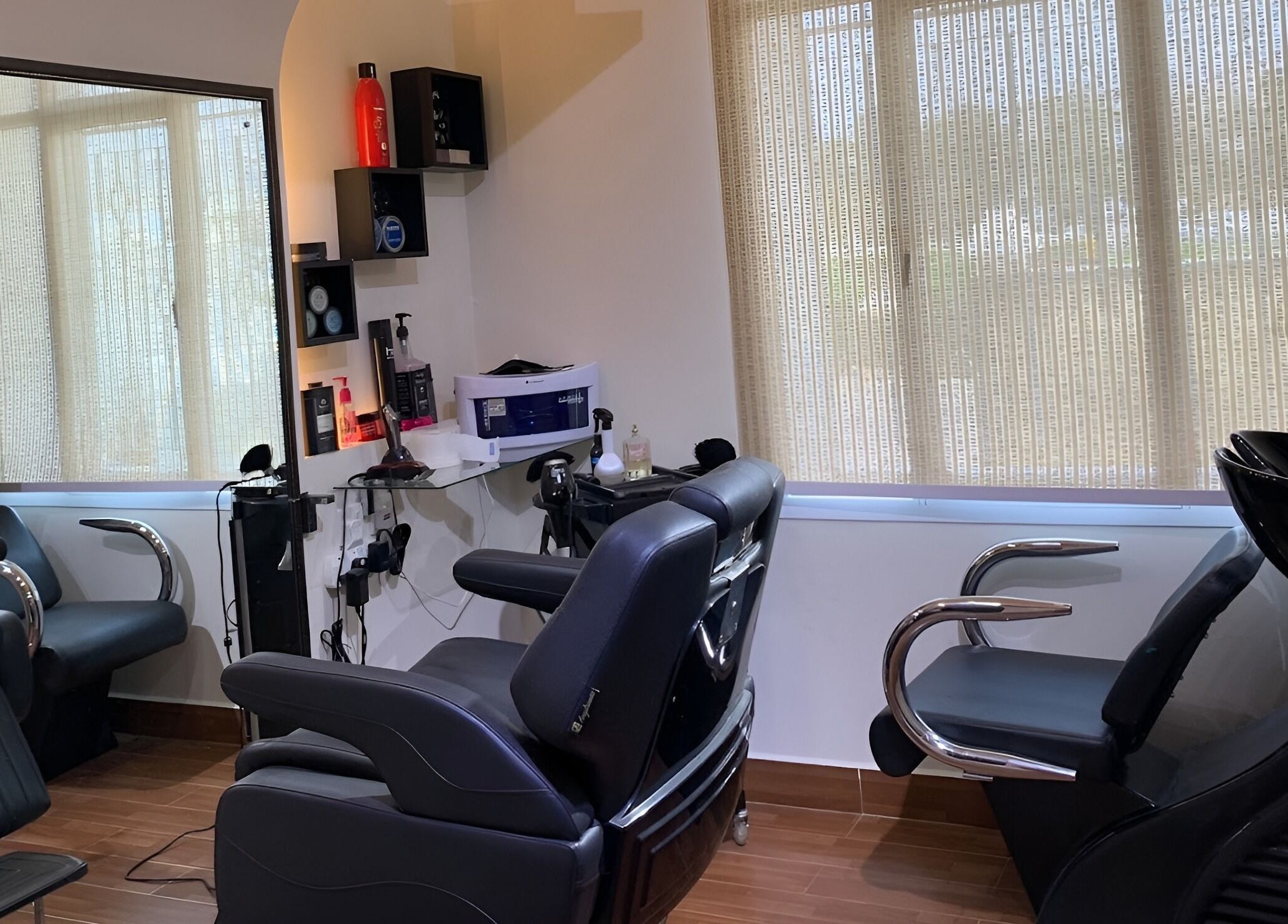 Sophisticated salon chairs and styling tools at Mr Spa, Muscat, Muscat Governorate, OM for ultimate relaxation.