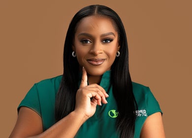 A professional wearing a green uniform represents Unblemished by Tish in South Hill, AI.