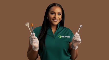 Beauty specialist at Unblemished by Tish (Anguilla), South Hill, holding skincare tools with precision.