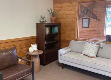 Inviting nook at Signature Style Salon in Trego, Wisconsin, US with comfortable seating and modern decor.