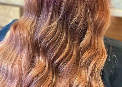 Elegant copper waves styled at Signature Style Salon, Trego, Wisconsin, US.