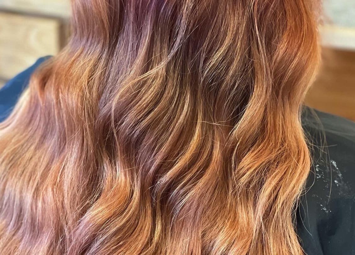 Elegant copper waves styled at Signature Style Salon, Trego, Wisconsin, US.