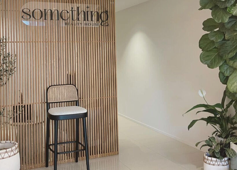 Elegant entry at Something Beauty House, Sydney, New South Wales, AU with stylish decor and lush greenery.